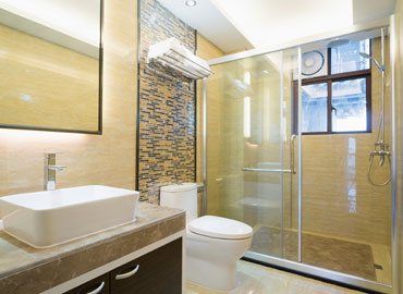 Shower renovation with tile accent wall